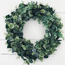 Load image into Gallery viewer, Beautifully simple and chic faux Eucalyptus Wreath in a farmhouse style completed with a rustic hessian bow. Perfect for Autumn or Winter decor. Place on your front door or hang inside your home.
